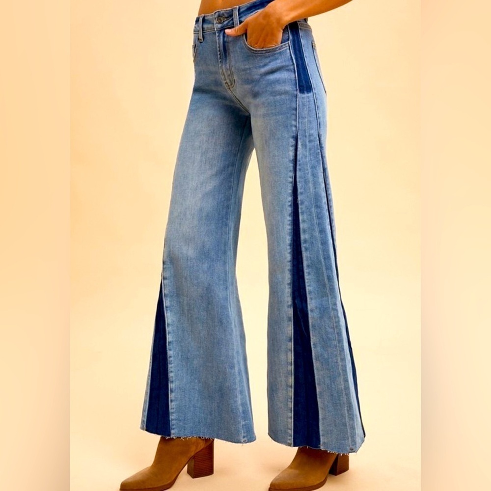 Vintage 70's look flare leg jean in a two tone wash and a high rise